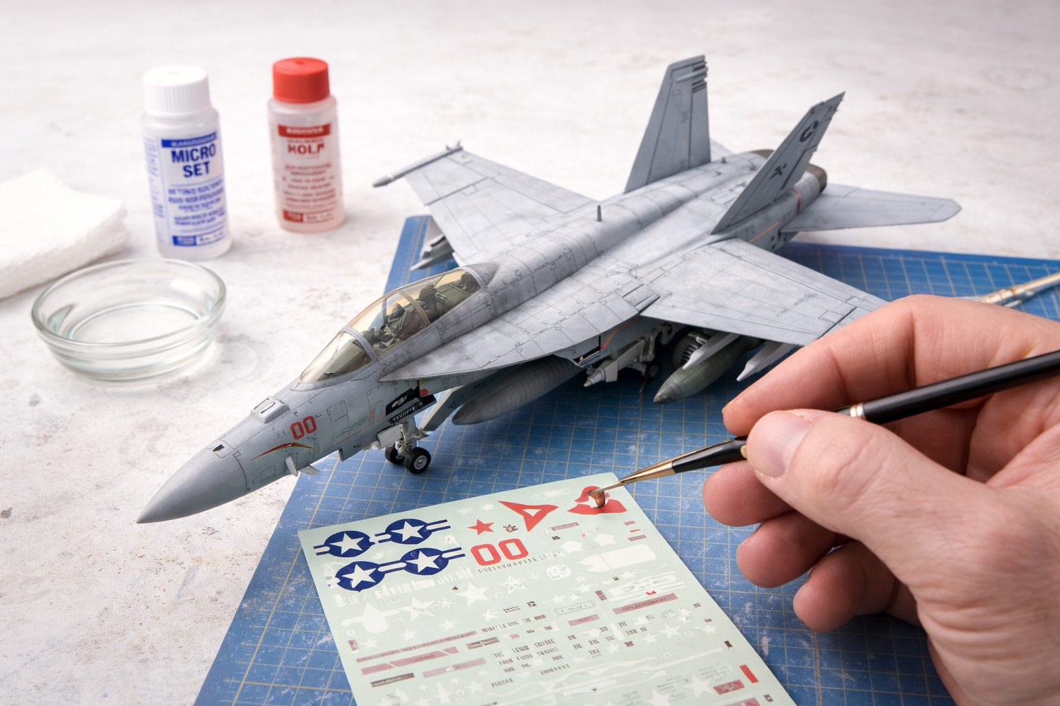 Décalcomanies : comment les appliquer sans bulle ni faux pli ?